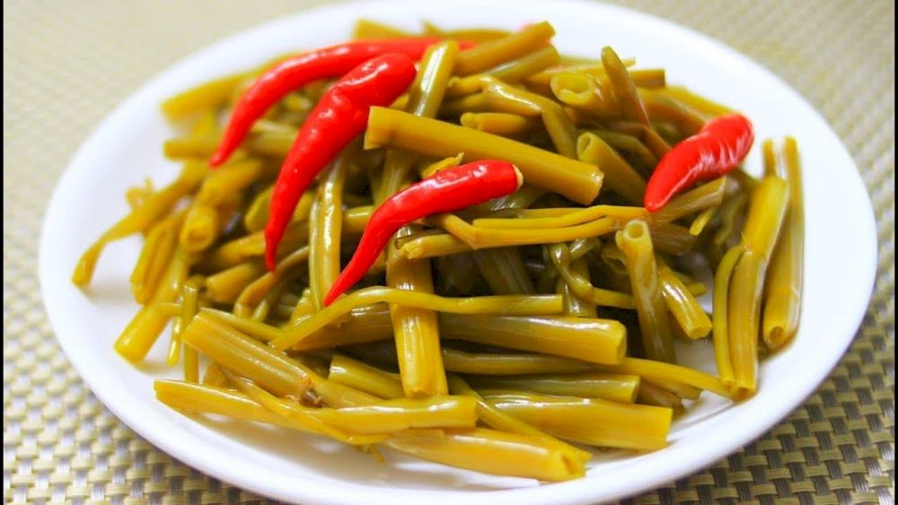 Pickled morning glory offers a tangy balance to rich vietnamese dishes